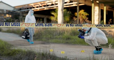 Buy stock photo Crime scene, people and tape outdoor for forensics, evidence photography and investigation. CSI team, hazmat suit or camera in field for inspection, observation or documenting proof at police markers