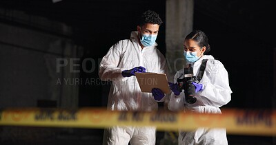 Buy stock photo Forensics team, report and crime scene investigation with clipboard, talking or show evidence at night. Investigators, man and woman with police outdoor for murder case, planning or clues for mystery