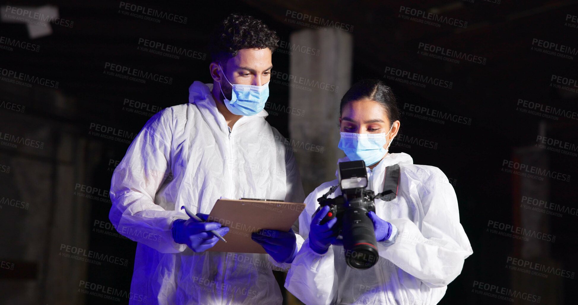 Buy stock photo Forensics team, camera and crime scene investigation with clipboard, discussion or evidence at night. Investigators, man and woman with police outdoor for murder case, photography and mystery clues
