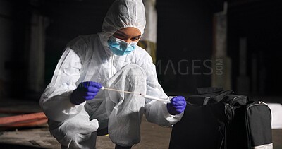 Buy stock photo Woman, swab and expert investigation at crime scene, blood sample and discovery of dna marker. Female person, homicide evidence and hazmat suit for safety, night and search for forensics in case