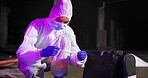 Woman, swab and dna investigation at crime scene, blood sample and discovery of marker. Female person, homicide evidence and hazmat suit for safety, night and search for forensics clues in case