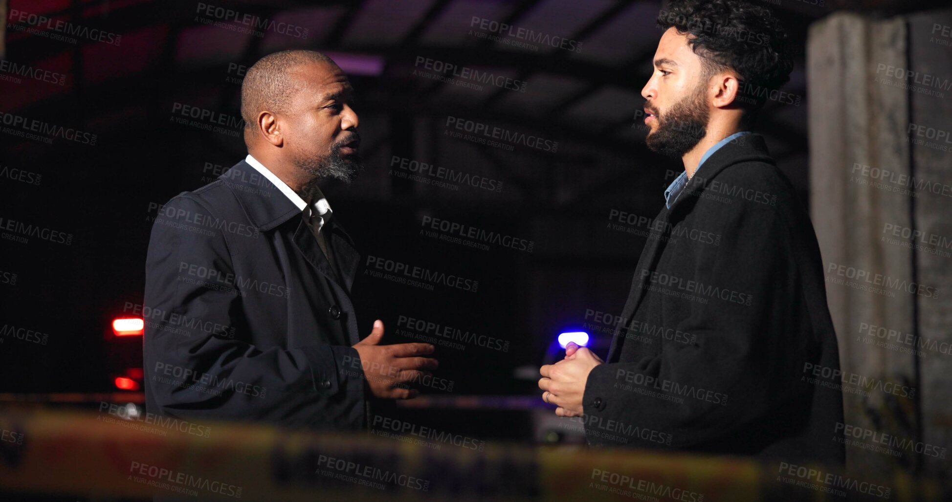 Buy stock photo Investigation, detective and police in discussion at crime scene for criminal inspection, information and feedback. CSI collaboration, people and legal justice in building at night with conversation