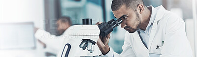 Buy stock photo Cropped shot of a young male scientist working in his lab