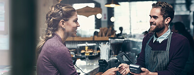 Buy stock photo Shot of a customer making a credit card payment at a cafe