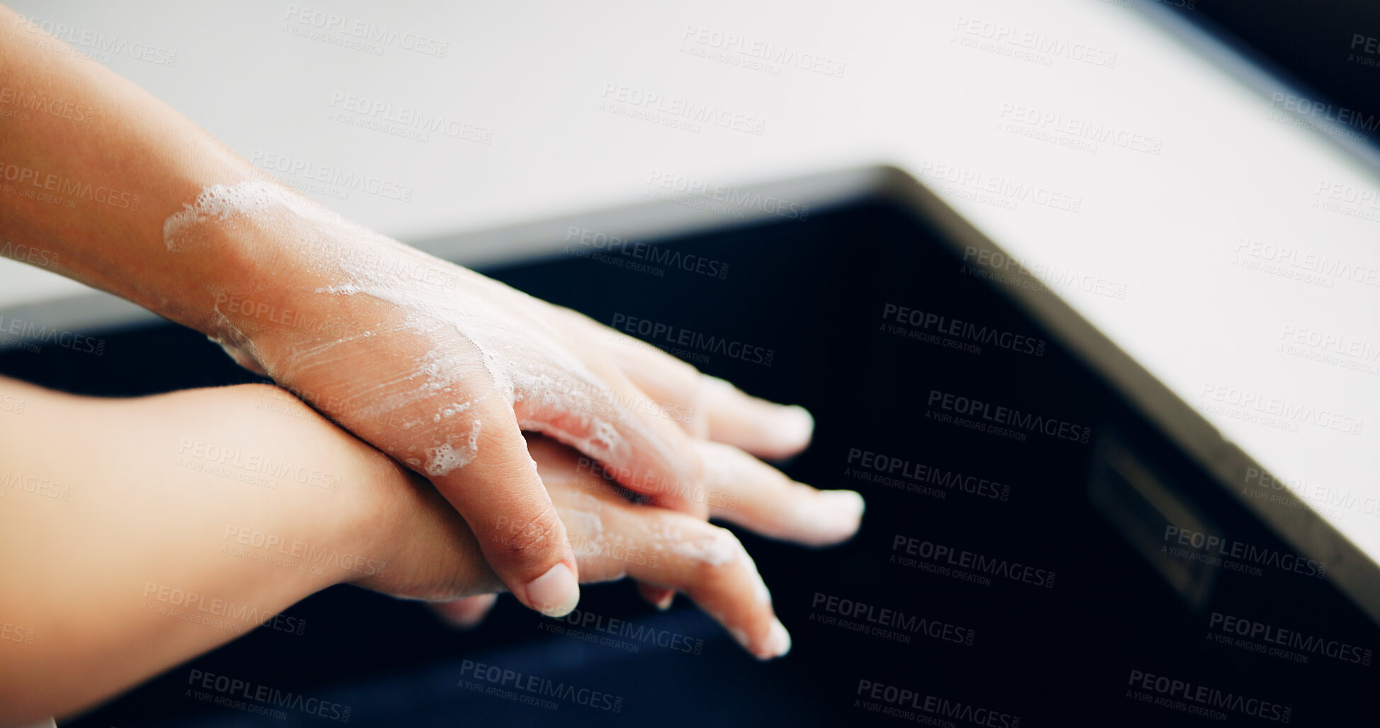 Buy stock photo Person, foam and washing hands in home for cleaning, removing germs and bacteria prevention at basin. Woman, fingers and soap in bathroom for hygiene, skin hydration and routine care for wellness