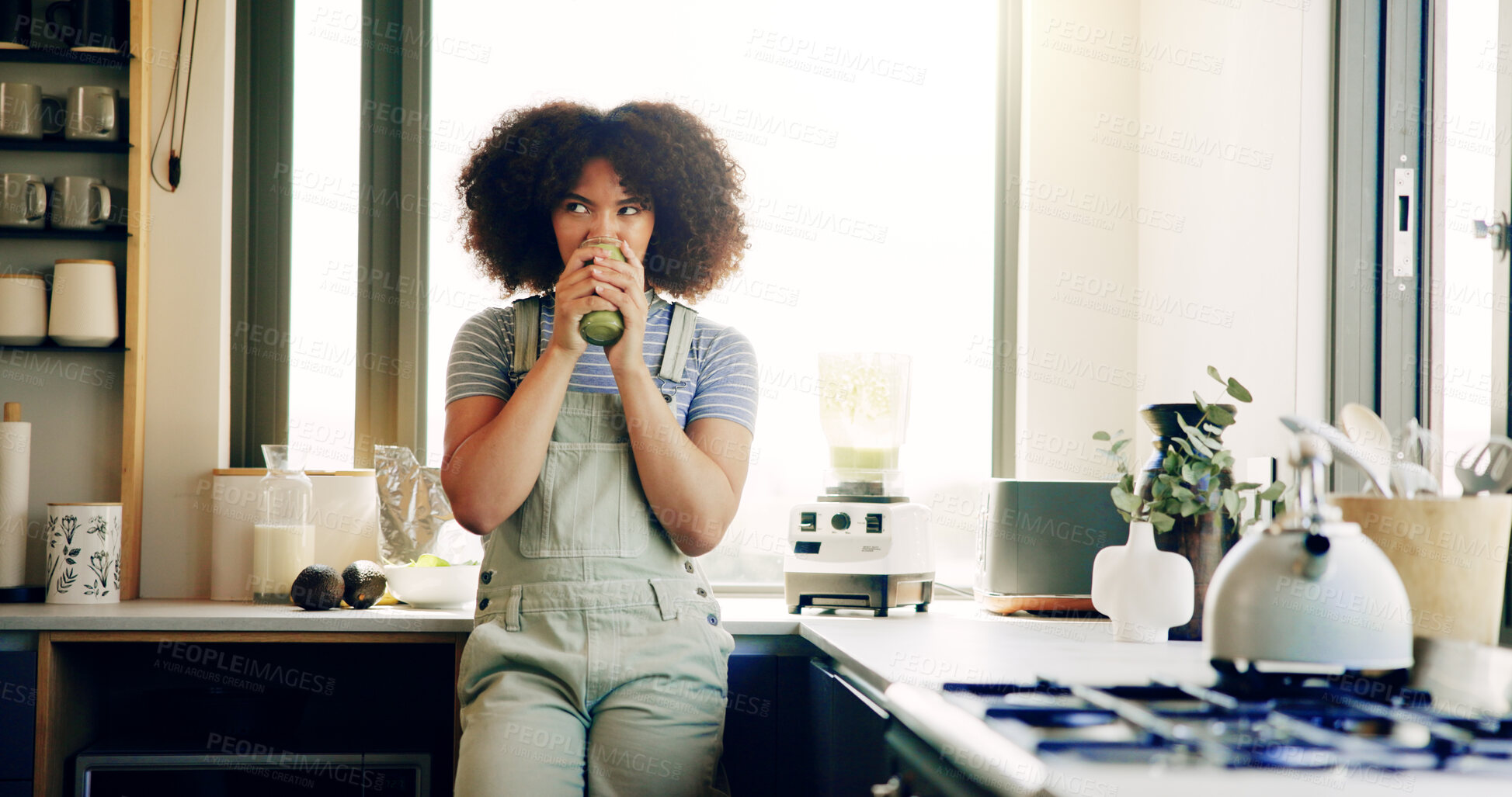 Buy stock photo House, drinking and woman with green juice in kitchen, nutrition and protein supplement. Apartment, healthy person or girl with diet, vegetarian or vitamins with minerals, morning routine or wellness