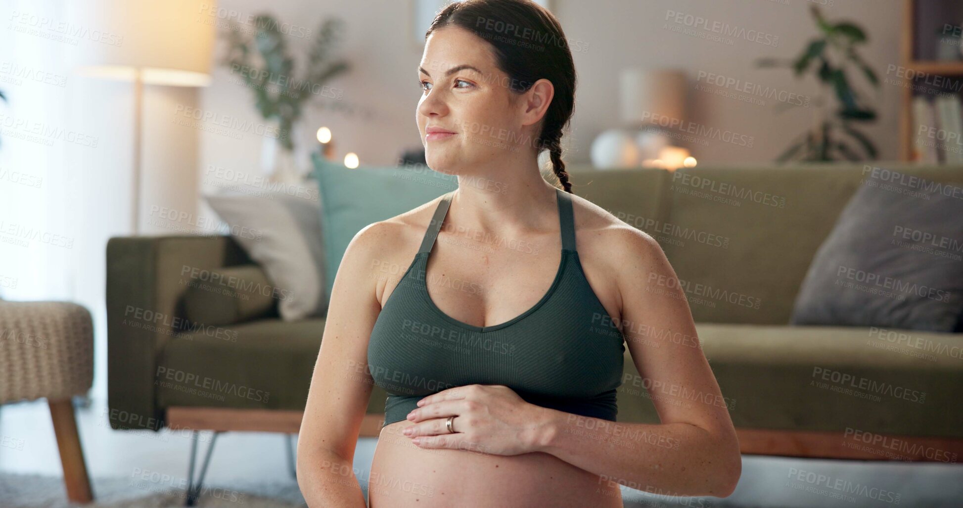 Buy stock photo Pregnant woman, exercise and belly on floor in home with thinking, care and wellness in living room. Person, mother and reflection with touch, love and prenatal growth for stomach in lounge at house