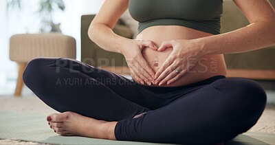 Buy stock photo Woman, meditation and heart hands with pregnancy on yoga mat at home with health, love and wellness. Morning, care and balance in living room with pregnant mama with abdomen, pilates and healthy body
