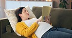Pregnant woman, book and reading on sofa for information, parent knowledge and wellness. Future mother, home and literature for pregnancy education, fetal development and advice for newborn care