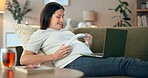 Smile, laptop and music for pregnant woman with sofa, living room and home for baby audio bonding. Headphones, health and streaming for happy mother with apartment, development and pregnancy wellness