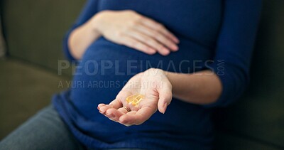 Buy stock photo Pills, healthcare and hands of pregnant woman on sofa for prenatal vitamins, medicine and prescription. Wellness, folic acid and supplements with person at home for baby, growth and pregnancy