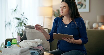 Buy stock photo Home, packing and pregnant woman on sofa with checklist, count and planning with baby product inventory. Schedule, clothes and girl on couch with notes, clipboard and pen for pregnancy preparation