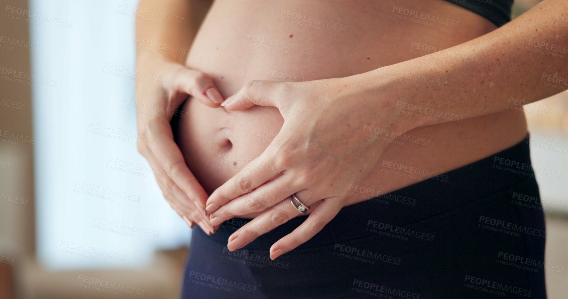 Buy stock photo Heart hands, love and stomach of pregnant woman in home for body, health and prenatal growth. Support, ivf success and fertility with closeup of person for maternity, motherhood and wellness