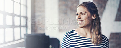 Buy stock photo Shot of a young designer using her digital tablet in her office