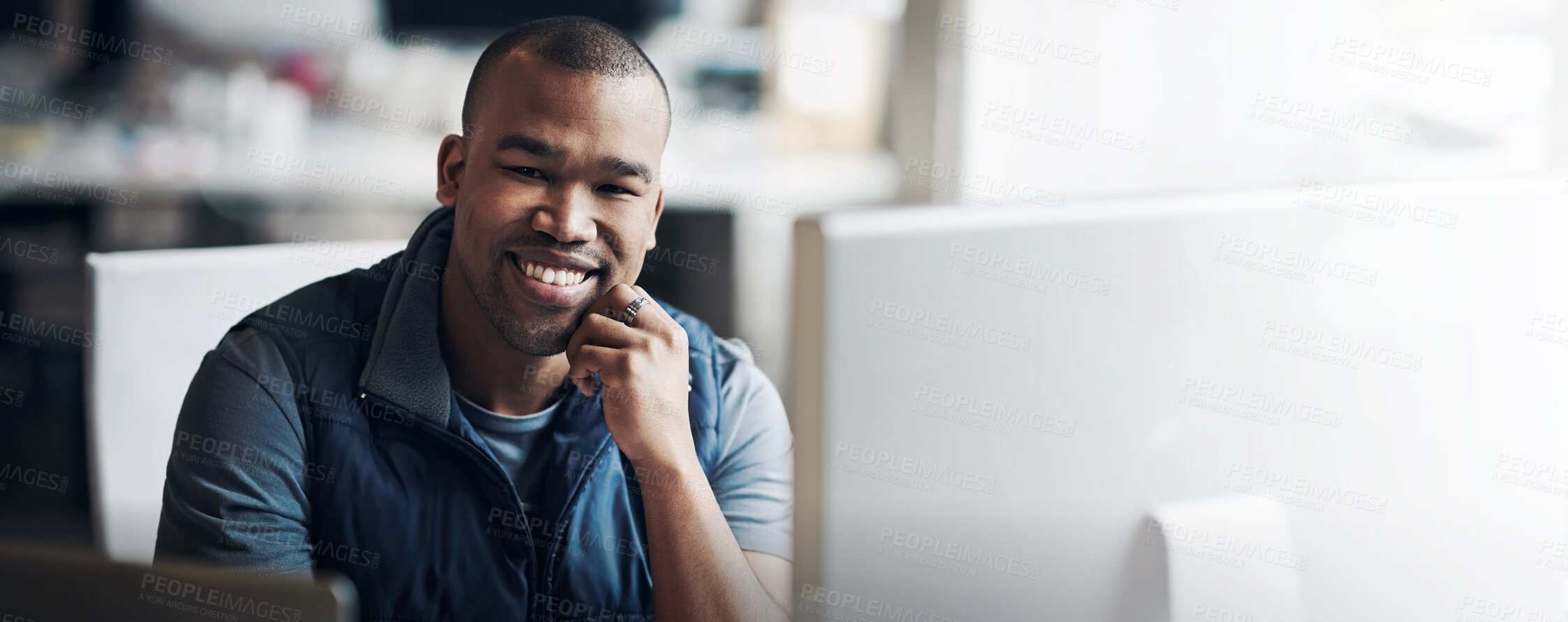 Buy stock photo Portrait of a young designer sitting at his desk