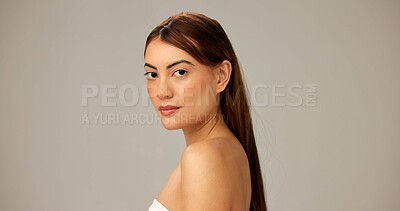 Buy stock photo Skincare, natural and portrait of woman with glow, dermatology or mockup space on gray studio background. Face, beauty and confident model with makeup, cosmetics or spa facial treatment for aesthetic