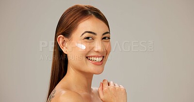 Buy stock photo Portrait, smile and woman with cream, skincare and dermatology on gray studio background. Person, model and girl with happiness, cosmetics and container for creme, healthy skin and grooming routine