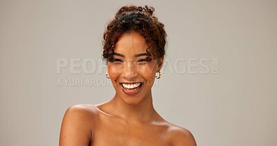 Buy stock photo Skincare, beauty portrait and woman laugh for glow, dermatology and results on gray studio background. Face, smile and African model with makeup, cosmetics and spa facial treatment for aesthetic