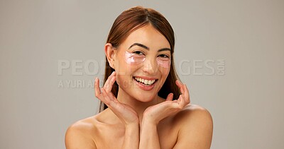 Buy stock photo Portrait, smile and woman with cream, cosmetics and dermatology on gray studio background. Person, model and girl with skincare, aesthetic and cheerful with creme, healthy skin and grooming routine