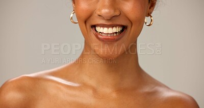 Buy stock photo Closeup, teeth whitening and woman with smile, oral health and dental hygiene on gray studio background. Person, mouth and girl with lips, wellness and remove plaque with fresh breath and self care