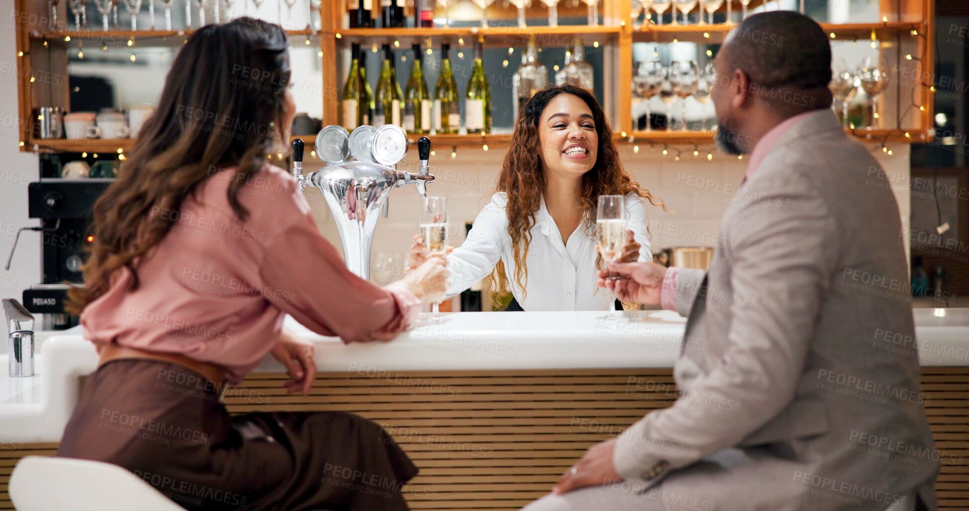 Buy stock photo Champagne, hotel bar and business people with meeting, celebration and success for teamwork or victory. Bartender, woman and man with alcohol, cheers and work trip for hospitality and collaboration