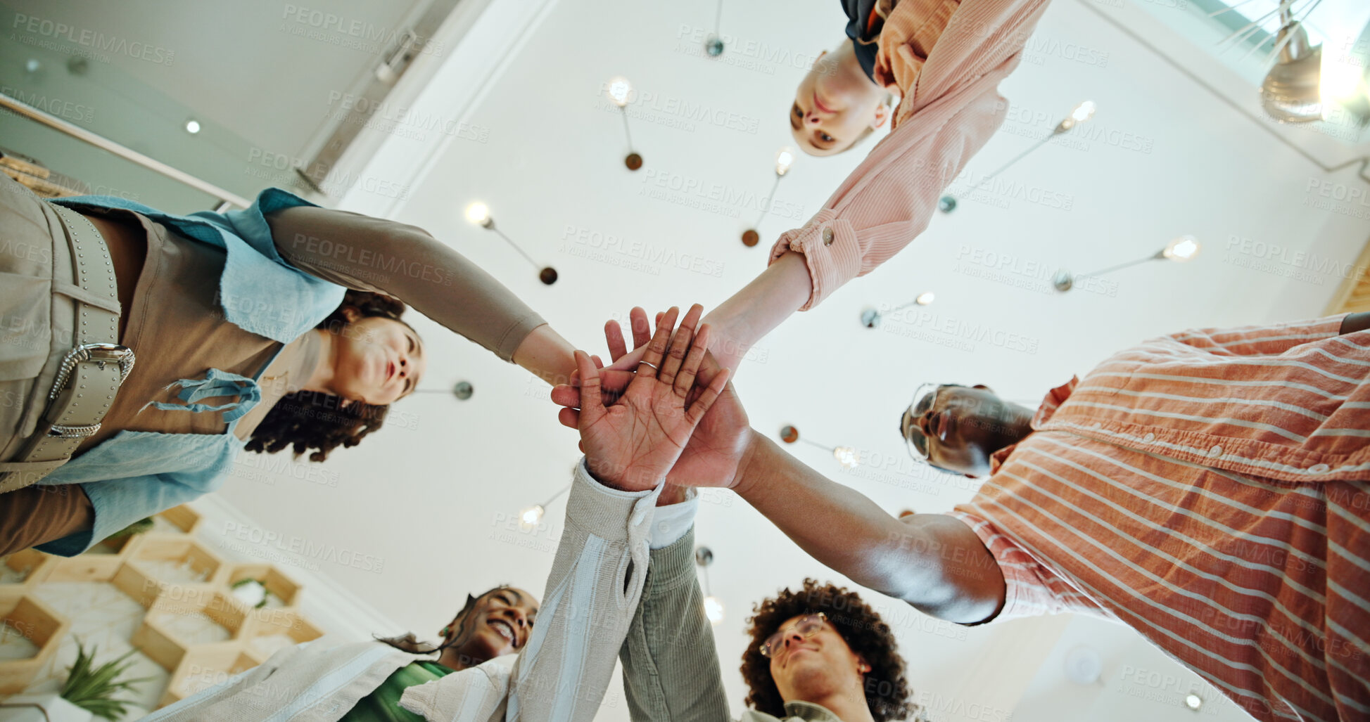 Buy stock photo Campus, students and stack of hands for education, english project and support for studying as team. College, people and friends with huddle for exam success, solidarity and celebration by low angle