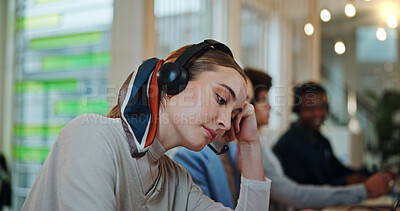 Buy stock photo Call center agent, woman and tired in business as customer service professional for sales company. Female person, headset and consultant in telemarketing agency as bored, fatigue or burnout in office