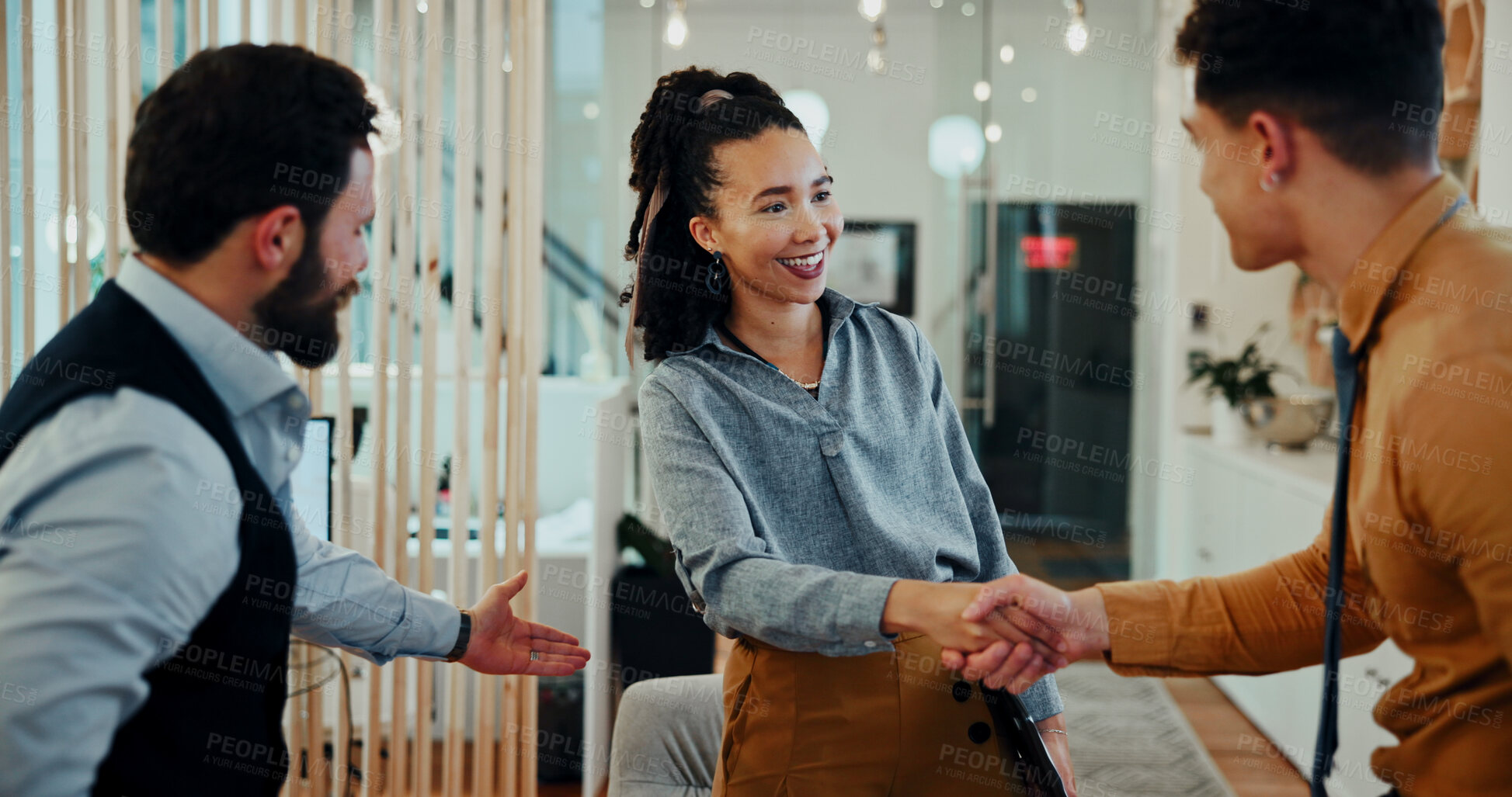 Buy stock photo Man, woman and shaking hands with smile at meeting in office, welcome and collaboration at media company. Business people, group and handshake with b2b agreement, deal and thanks at creative agency