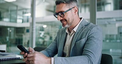 Buy stock photo Mature, business man and smile with smartphone in office for communication, text message or positive feedback on email. Professional, CEO and happy with phone for notification and reading good news