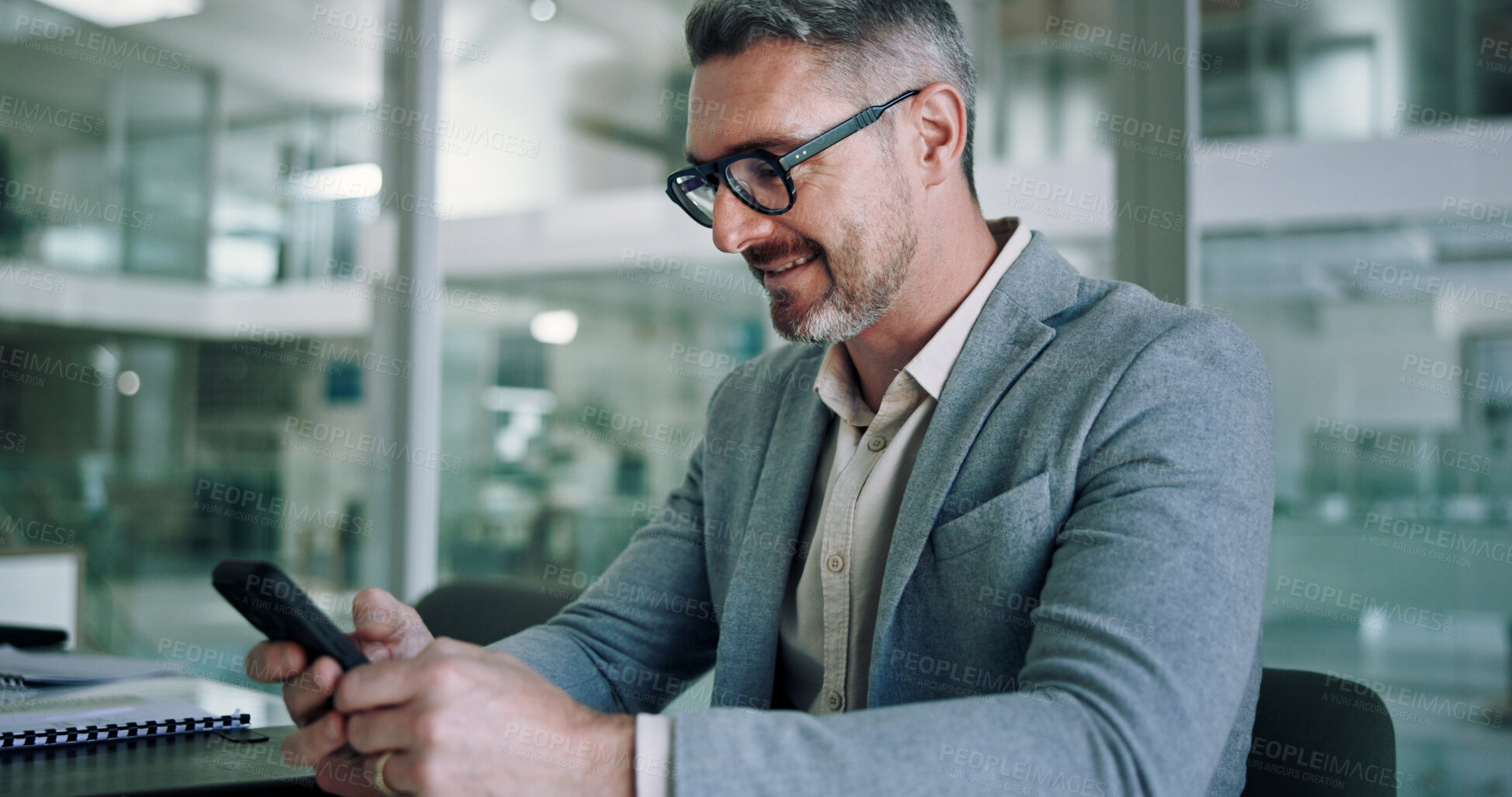 Buy stock photo Mature, business man and smile with smartphone in office for communication, text message or positive feedback on email. Professional, CEO and happy with phone for notification and reading good news