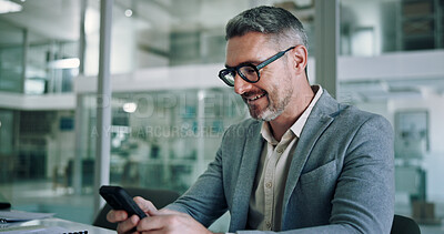 Buy stock photo Mature, business man and happy with smartphone in office for communication, text message or positive feedback on email. Professional, CEO and smile with phone for notification and reading good news