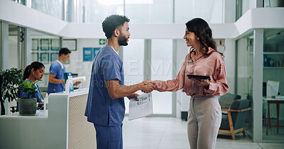 Buy stock photo Doctor, meeting and tablet with handshake for contract, agreement or hiring nurse at hospital. Man, woman or medical colleagues shaking hands for recruitment, deal or teamwork together at clinic