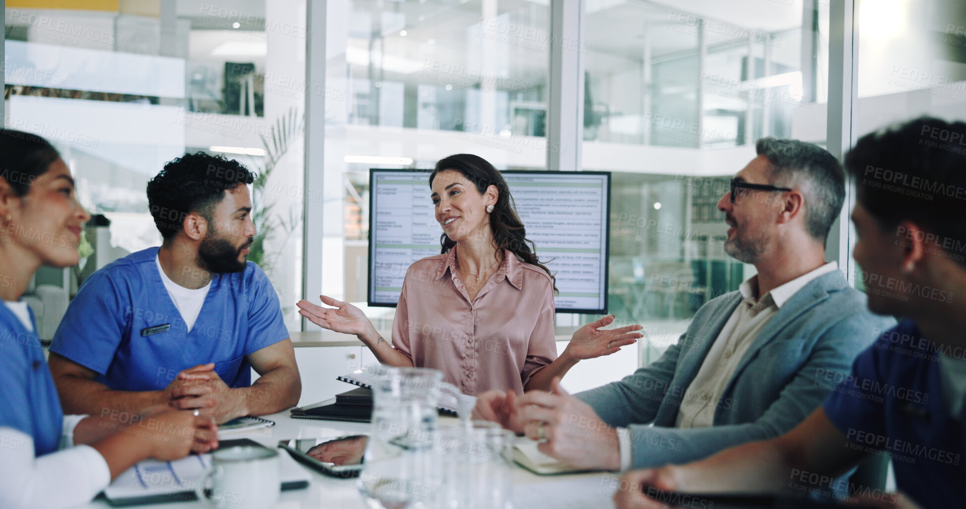 Buy stock photo Woman, medical team and meeting with presentation in conference for planning, proposal or discussion at hospital. Female person, speaker or group of healthcare employees listening to funding director