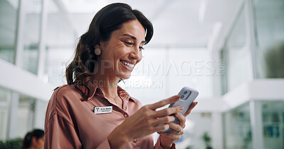 Buy stock photo Happy woman, doctor or typing with phone for communication, good news or telehealth at hospital. Female person, medical employee or smile with mobile smartphone for online donation to clinic research