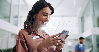 Buy stock photo Woman, phone and office with professional psychiatrist, texting and happy for message. Technology, mobile app and digital with social media and website scroll and smile from internet search.