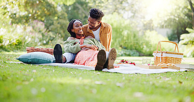 Buy stock photo Love, relax and black couple in park for picnic, bonding and happy outdoor adventure on weekend. Smile, man and woman in nature for romantic date, morning fun and embrace together in green garden