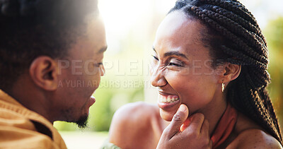 Buy stock photo Happy, love and black couple in park laughing together for bonding, relationship and affection in nature. Relax, dating and man and woman outdoors for romance, talking and commitment on weekend