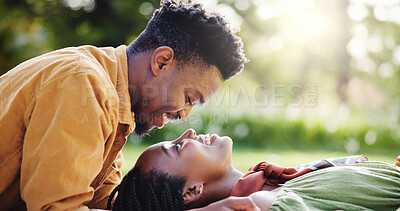 Buy stock photo Love, relax and black couple in park for bonding, connection and happy outdoor adventure on weekend. Smile, man and woman on picnic for romantic date, morning fun and embrace together in green garden