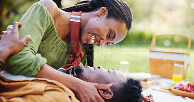 Buy stock photo Relax, laughing and love with black couple and picnic for bonding, happiness and romantic date. Calm, support and conversation with man and woman at park for commitment, valentines day and summer