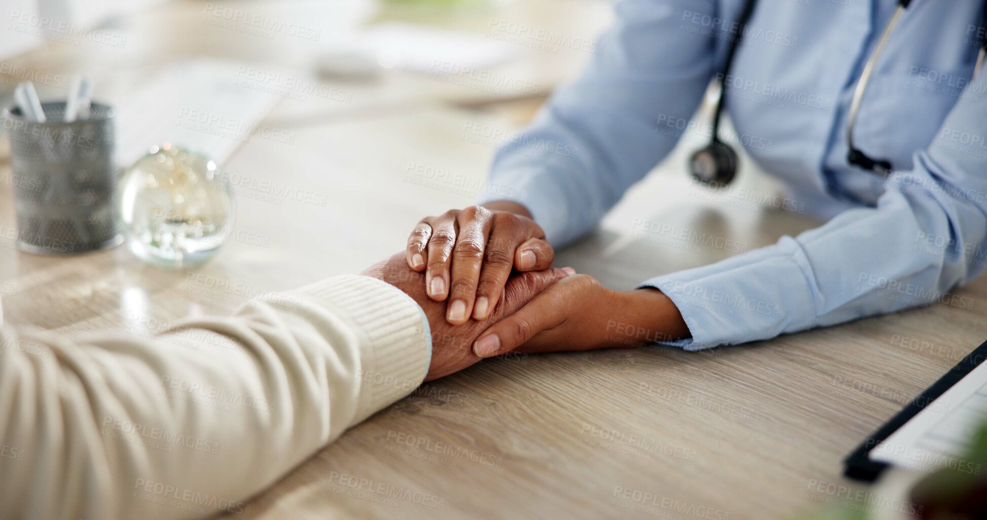 Buy stock photo Advice, doctor and patient holding hands in office for care, kindness and help at clinic consultation. Support, comfort and medical advisor with person for empathy, counseling or hospital healthcare