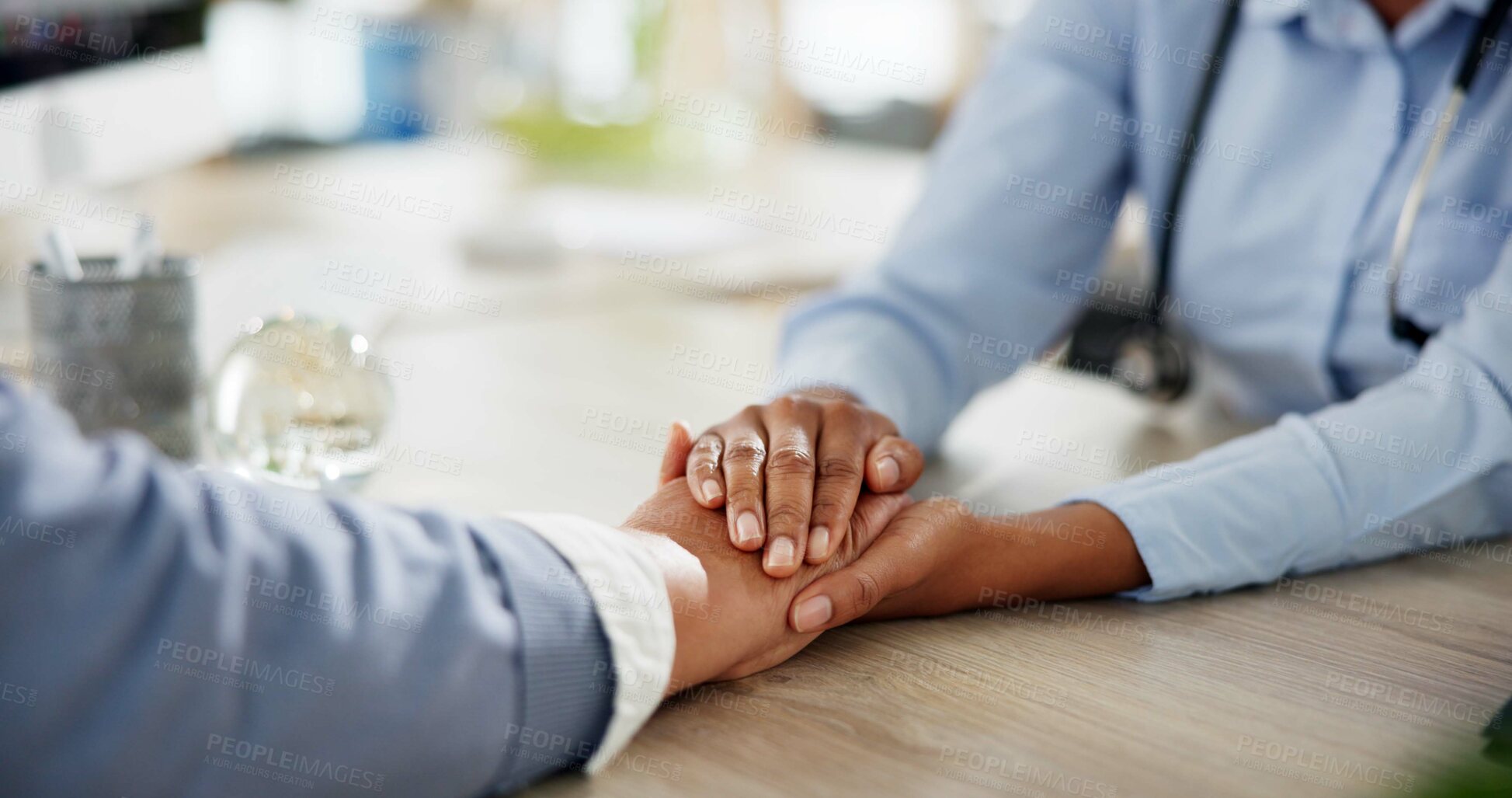 Buy stock photo Help, doctor and patient holding hands in office for care, kindness and advice at clinic consultation. Support, comfort and medical advisor with person for empathy, counseling or hospital healthcare