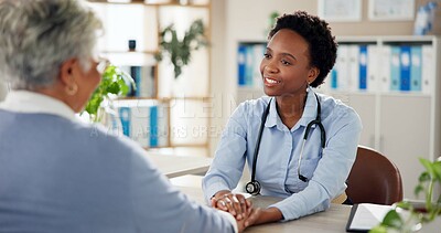 Buy stock photo Consulting, holding hands and healthcare with old woman and doctor for support, results or care. Medical, helping and discussion with people in clinic for treatment plan, checkup and patient exam