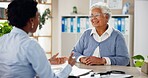 Consulting, happy and healthcare with old woman and doctor for insurance, results or diagnosis. Medical, helping and discussion with people in clinic for treatment plan, checkup and patient exam