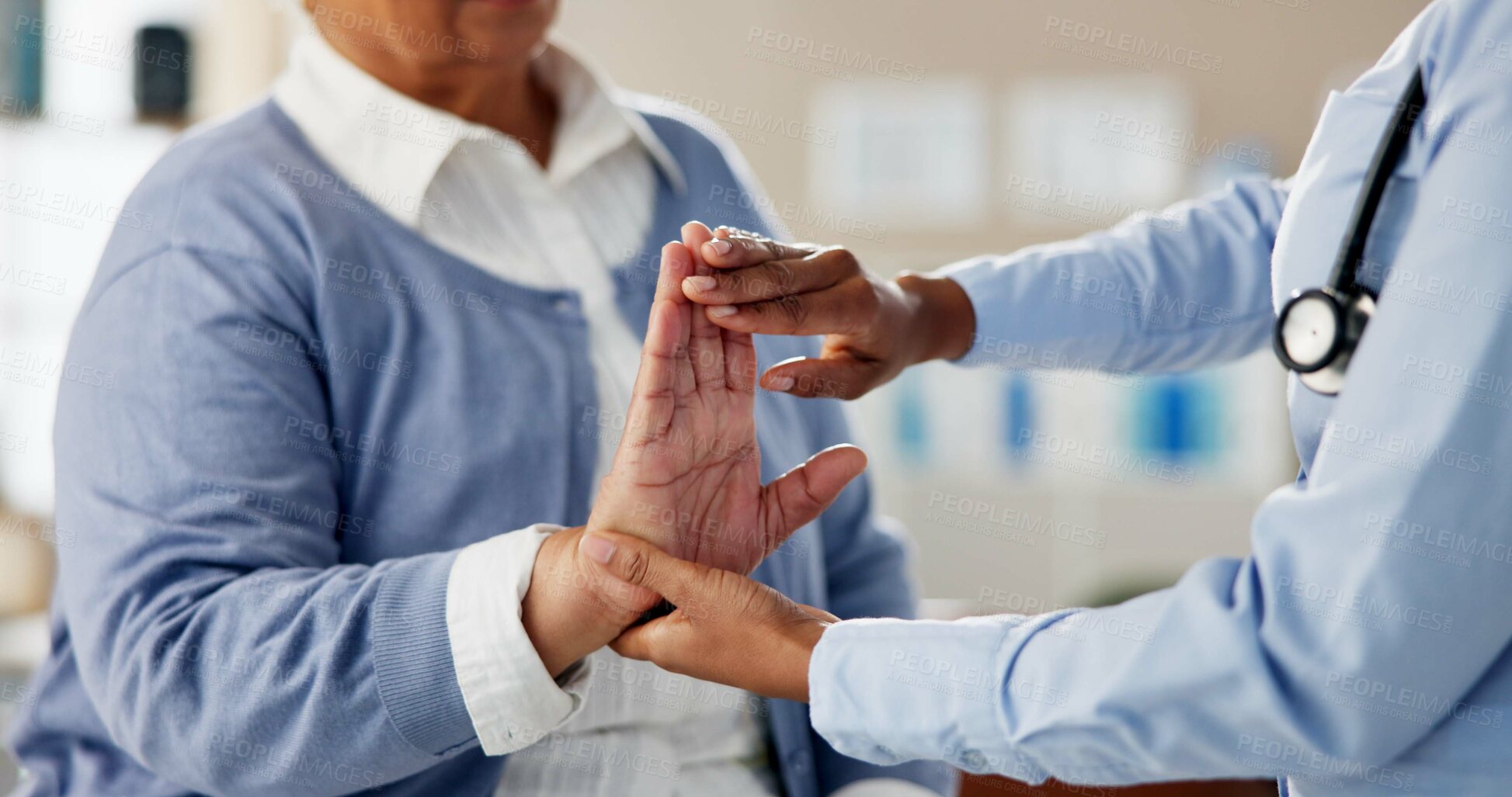 Buy stock photo Doctor, patient and hand stretching for arthritis checkup, assessment and diagnosis at clinic. Woman, physiotherapist and female pensioner with wrist exercise for healthcare, help and support