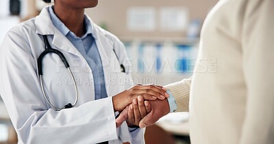 Buy stock photo Support, doctor and patient holding hands in office for care, kindness and help at clinic consultation. Advice, comfort and medical professional with person for empathy, trust or hospital healthcare