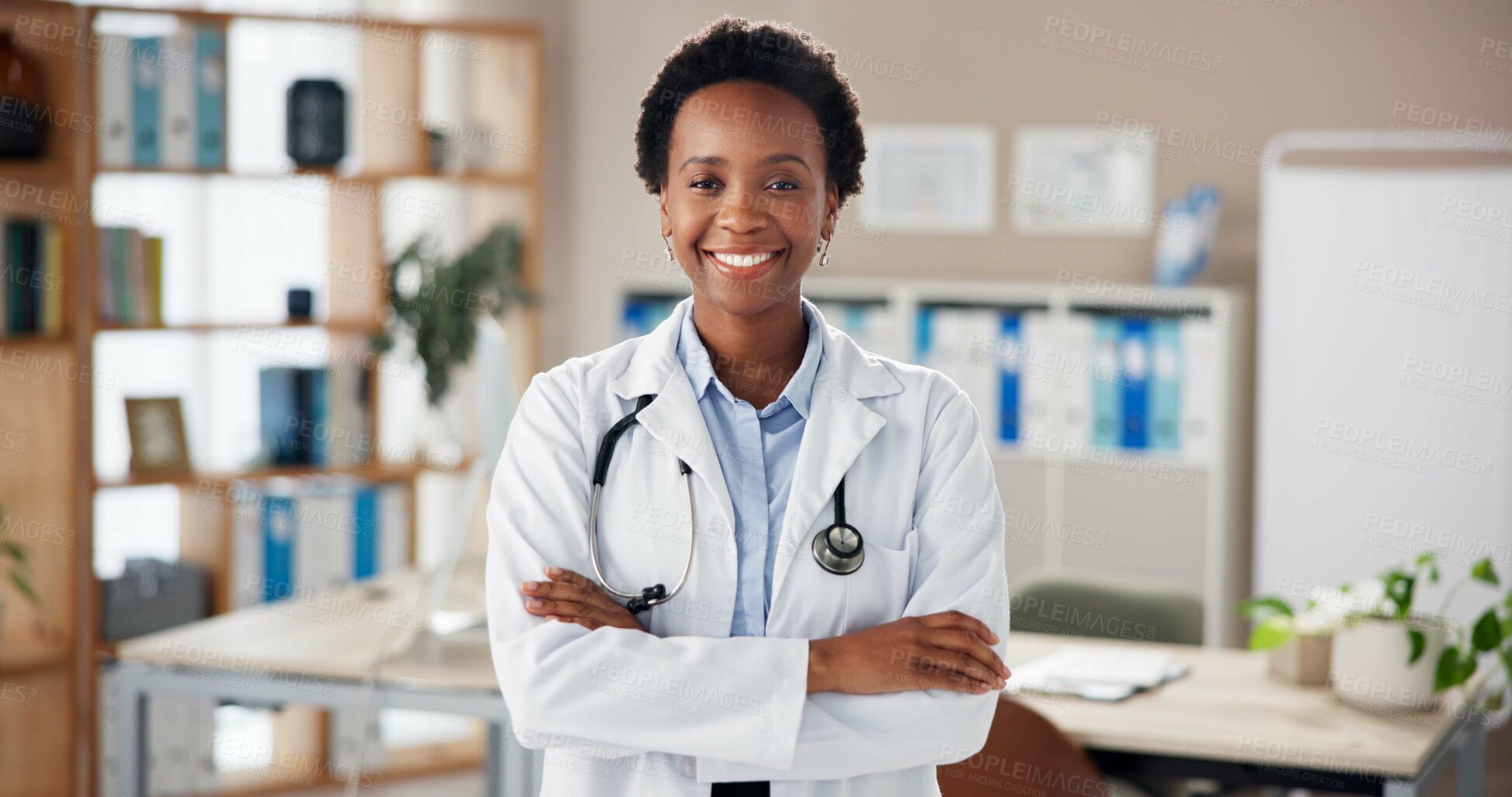 Buy stock photo Black woman, doctor and arms crossed in portrait at clinic with pride, smile and services with healthcare. African medic, person and happy for career with wellness, confident and hospital in Nigeria