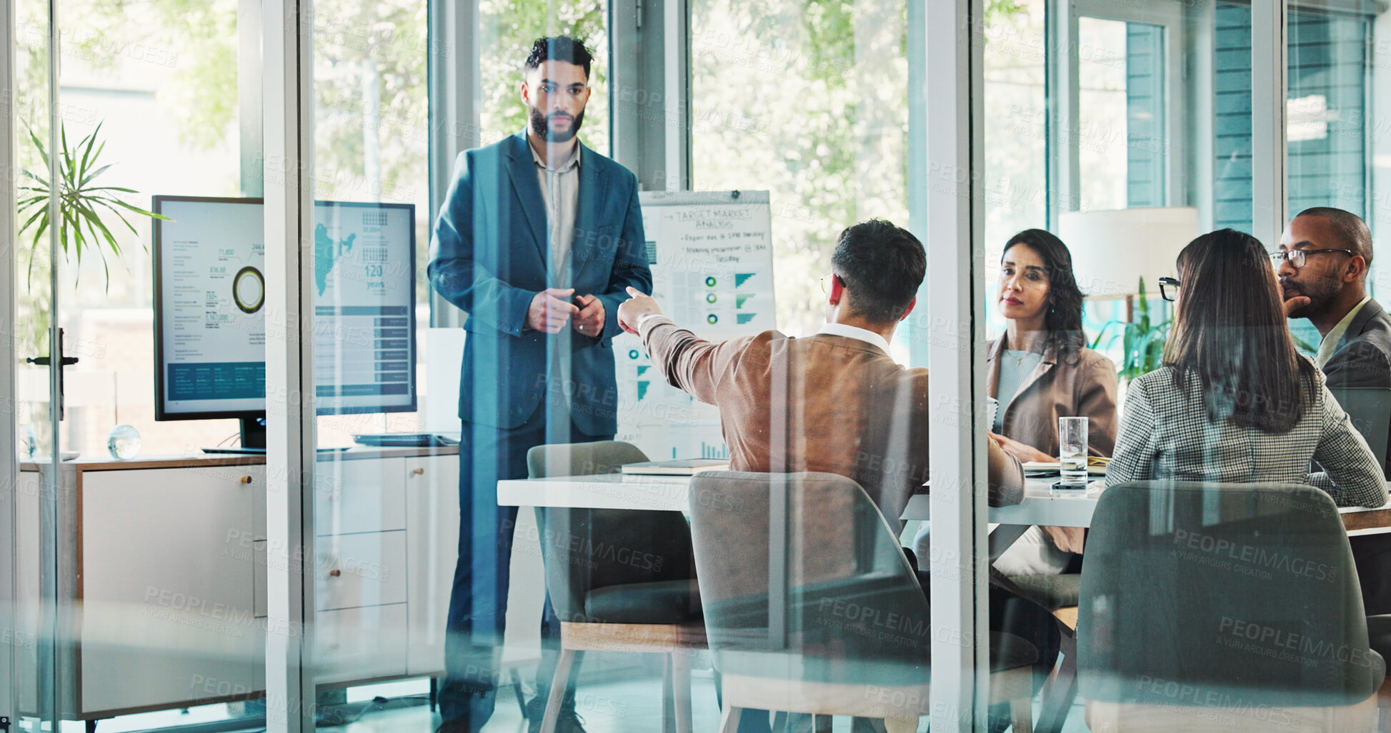 Buy stock photo Business people, meeting and pointing with question for presentation, analytics or statistics at office desk. Group, employees and team with answer, solution or idea for company growth in boardroom