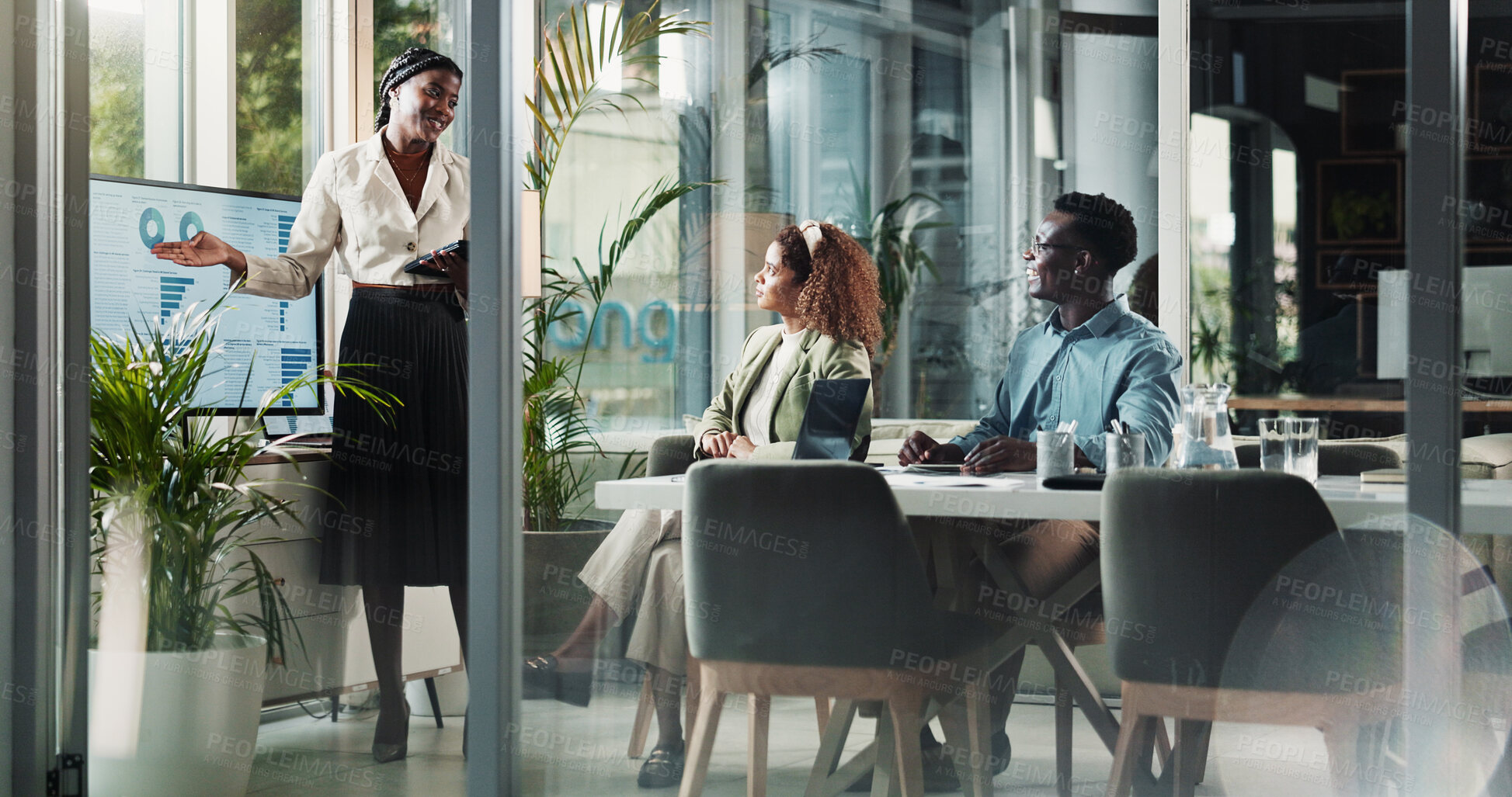 Buy stock photo Presentation, speaker and business woman in meeting for planning, teamwork or data analysis. Company profit, sales report and workshop with people in finance firm for investment, monitor and research