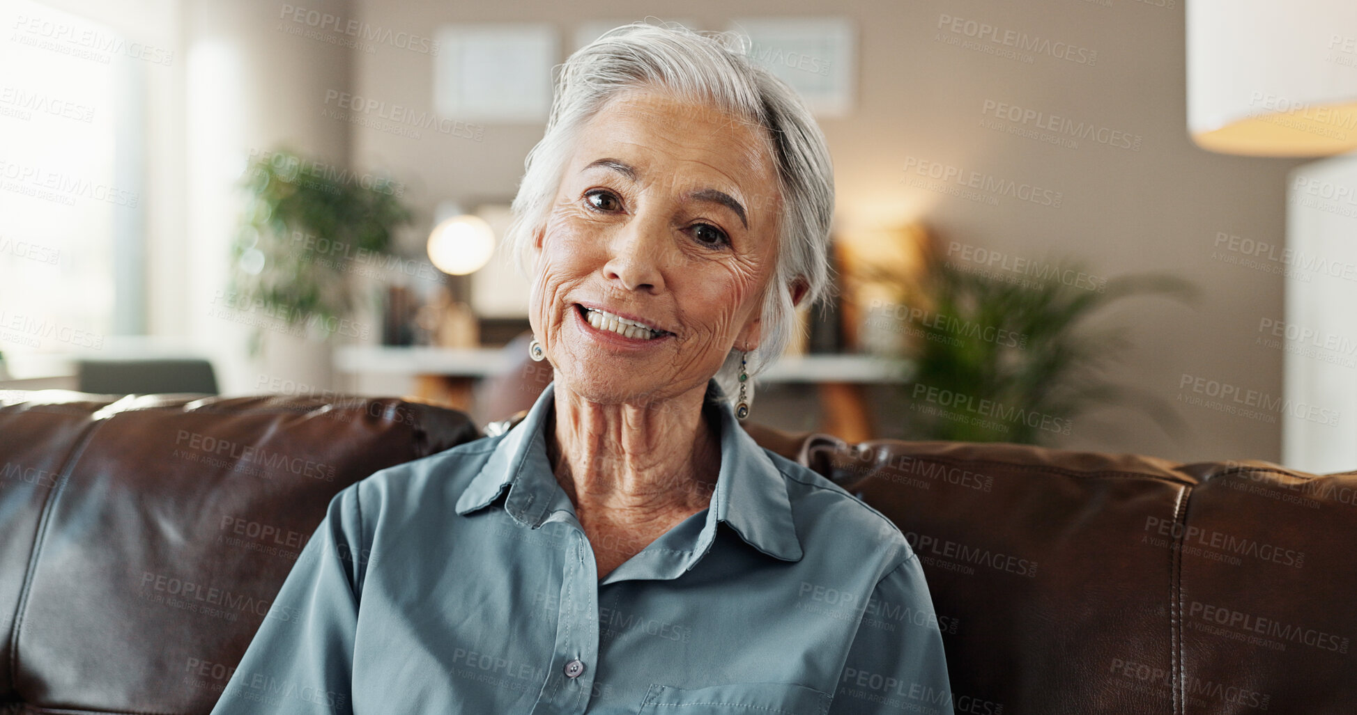 Buy stock photo Senior woman, portrait and positive mood on sofa in house for relax, retirement and peace on weekend. Elderly person, face and happy on couch in nursing home for break, pension or optimism with smile