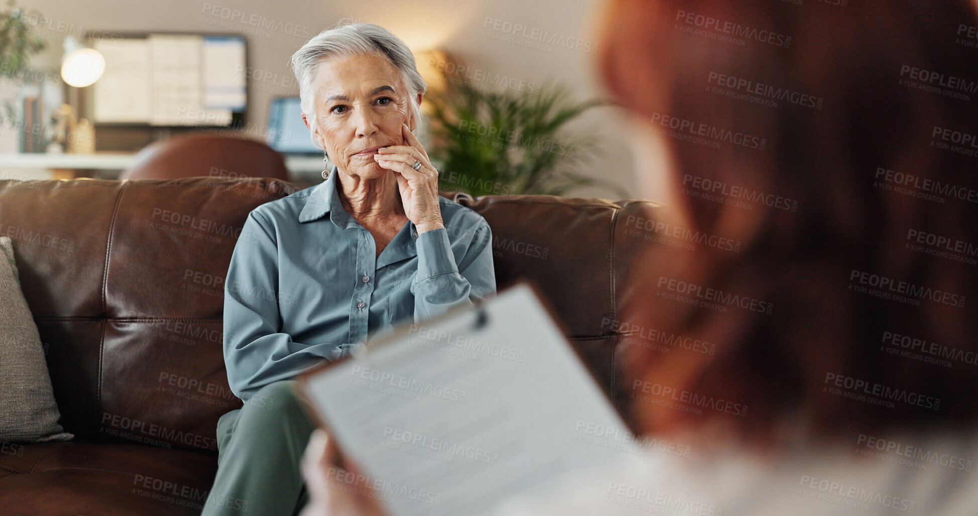 Buy stock photo Psychologist, clipboard and senior woman with notes and office from mental health assessment in consultation. Help, support and care with counseling, psychology and evaluation with advice on sofa